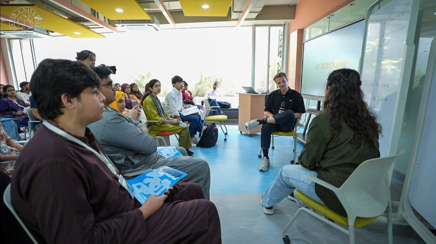 Demonstrating a live user interview in front of the cohort
