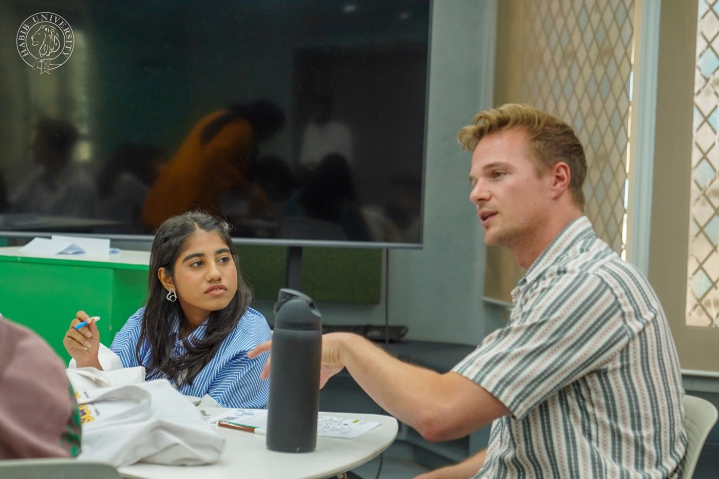 Coaching a student during a studio session
